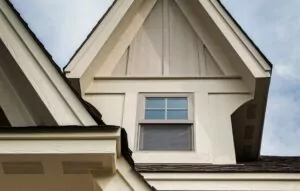 Intricate siding details on a beige home