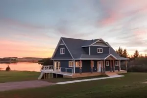 Blue home on a lakeside viewed during sunset