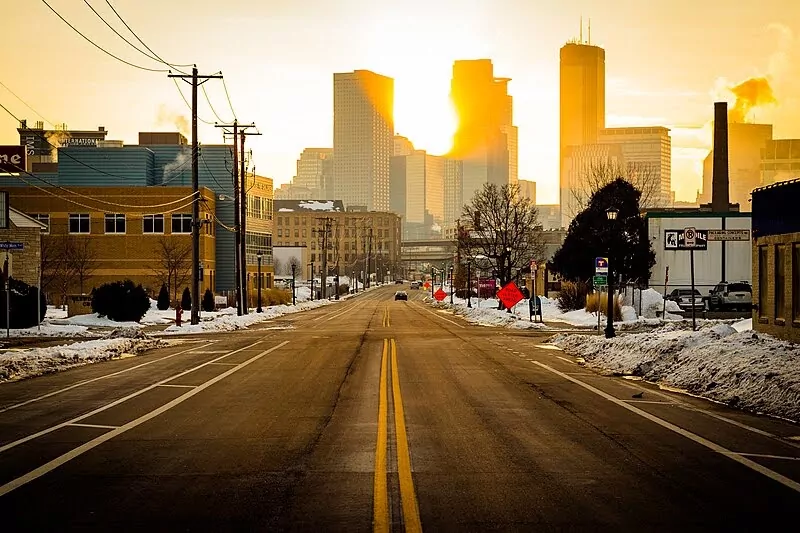 View looking down a road in Minneapolis at sunrise