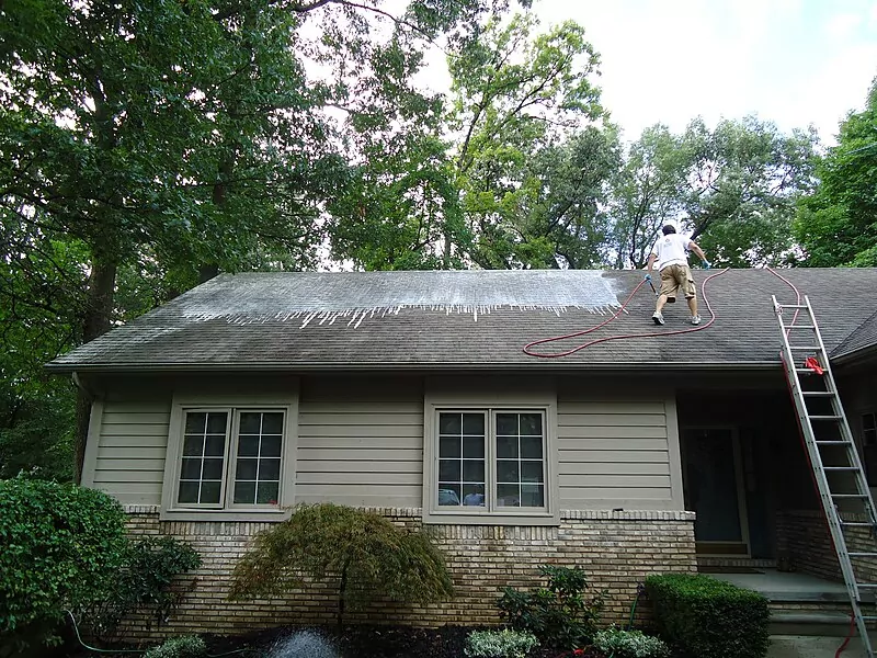 Home with its roofing issues being handled by professionals