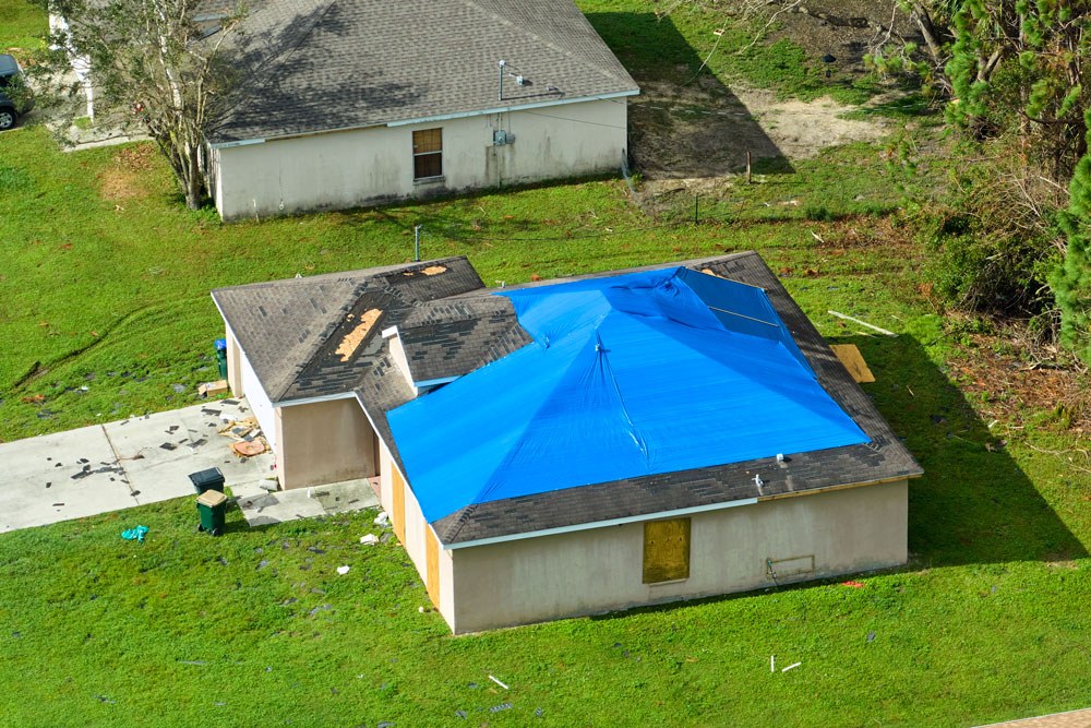 committed365 damage ermergency tarping2