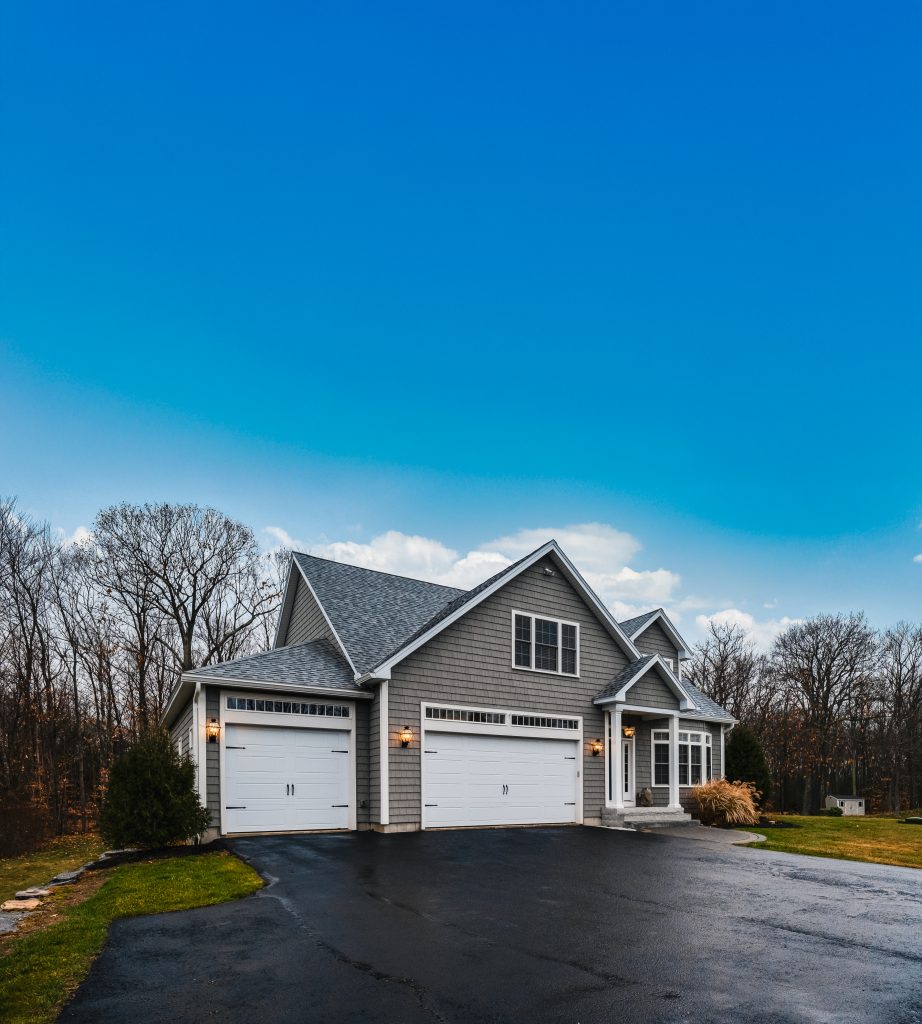 gray walled suburban house with white asphalt driv 2025 02 11 17 57 29 utc Edit Edit