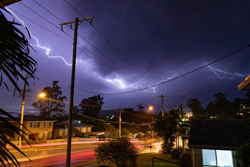lightning flashing across the sky in suburban bris 2026 03 17 08 11 34 utc