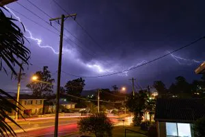 lightning flashing across the sky in suburban bris 2026 03 17 08 11 34 utc