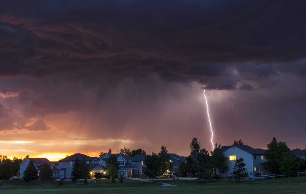 lightning strikes above suburban homes during dram 2026 01 09 08 42 18 utc
